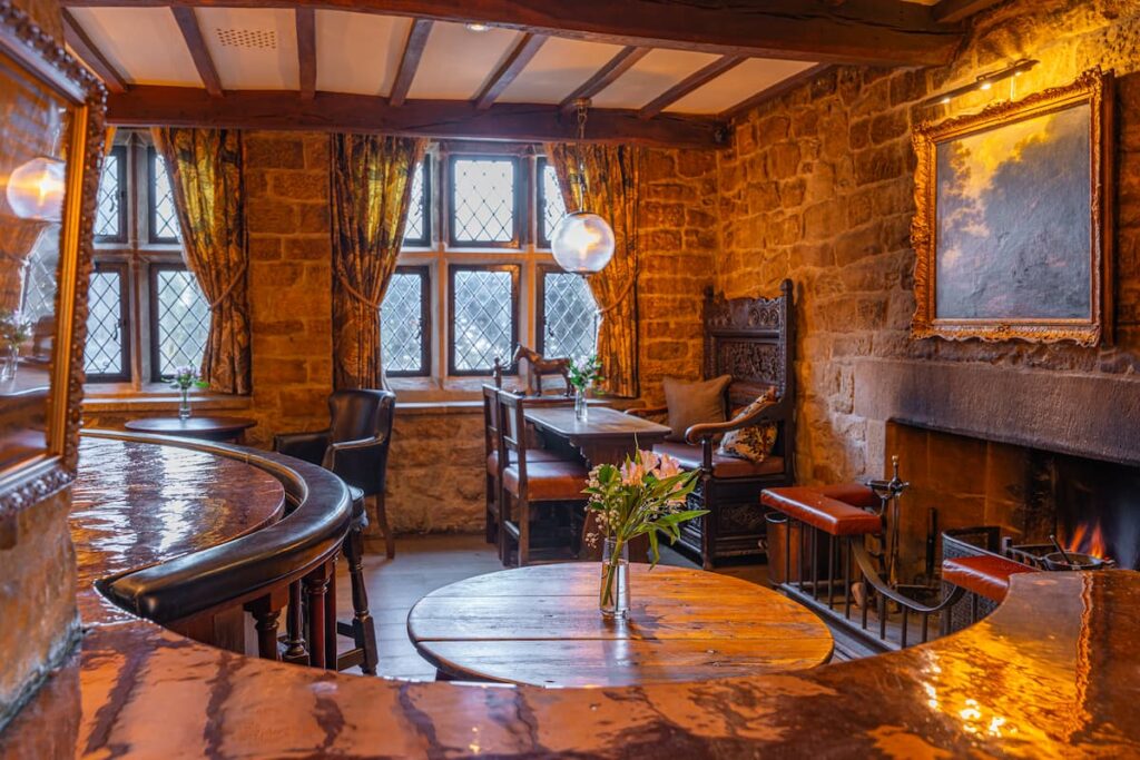 Bar-seating-area-The-Peacock-at-Rowsley Tables in the bar at The Peacock at Rowsley