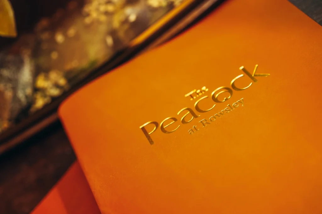 Photograph of the outside of the menu booklet at The Peacock at Rowsley
